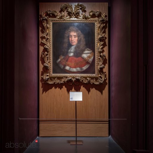 Pinnacle label holder displaying information for an old artwork in a detailed, engraved frame.